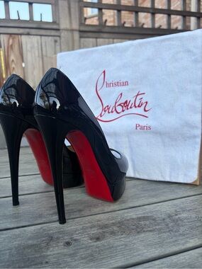 Christian Louboutin Black Patent Leather Stiletto Pumps with Signature Red Soles
